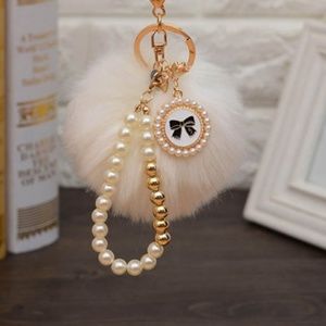 White puffball keychain